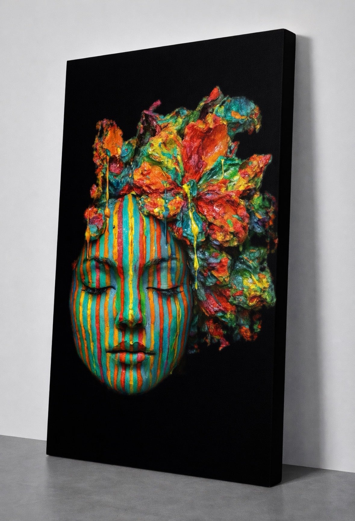 Full artwork view of Emerging Face by NAÏAH, a colorful striped sculptural female face with a headdress on a black background.